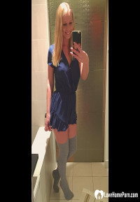 Blonde with tan lines teasing with her breasts