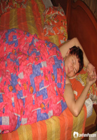 Redhead MILF pisses and takes a shower