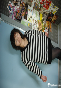 Hot Asian strips pantyhose and does sexy poses