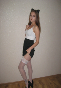 Kinky girlfriend in stockings displaying her amazing legs