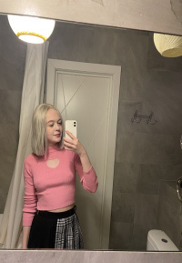 Tattooed blonde showing off her sexy tattoos