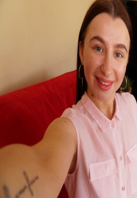 Cute brunette shows off her petite curves